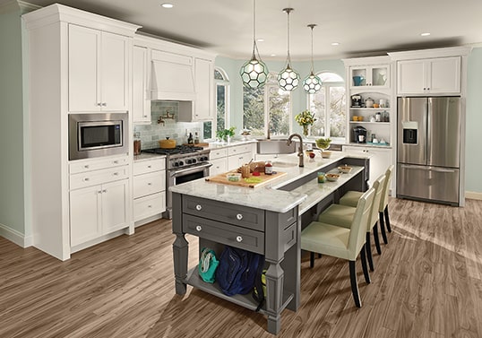 Transitional KraftMaid kitchen in Dove White with center seating island in Greyloft