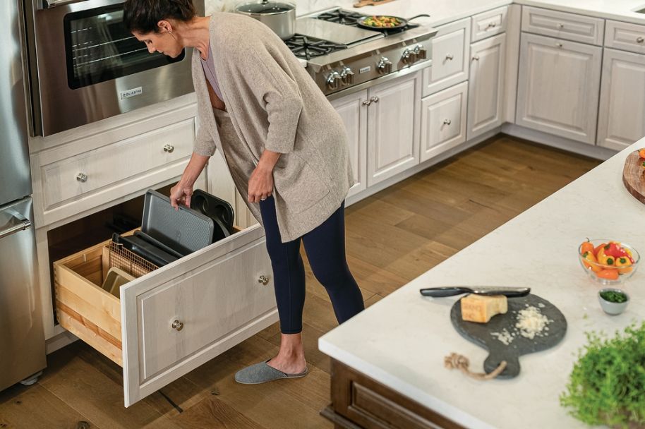 KraftMaid kitchen baking station ideas with integrated baking tray pull-out base cabinet in Translucent Limestone